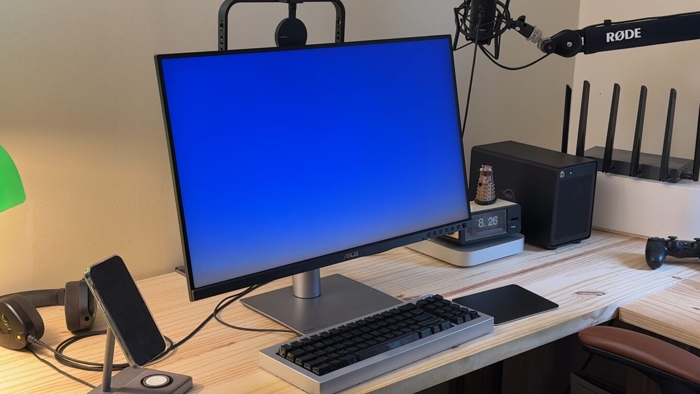 ASUS ProArt 5K Angle ASUS ProArt 5K in a Mac mini setup with various peripherals.