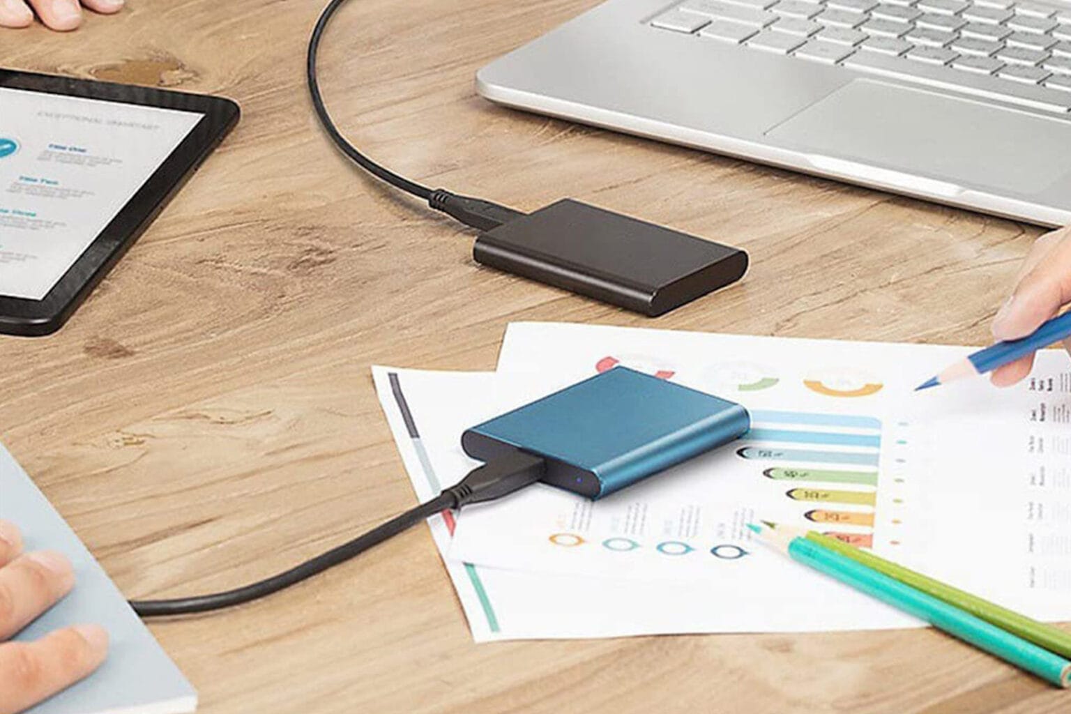 A pair of 2TB portable SSD drives, which connect to a Mac using a USB-C cable.
