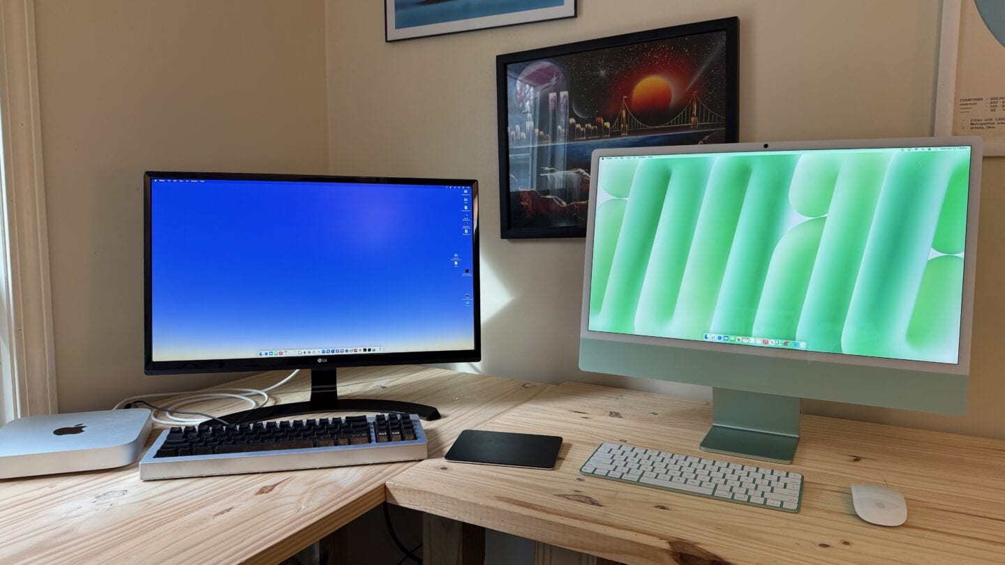 Mac mini and iMac Mac mini setup with black display, keyboard and trackpad next to a green M4 iMac.