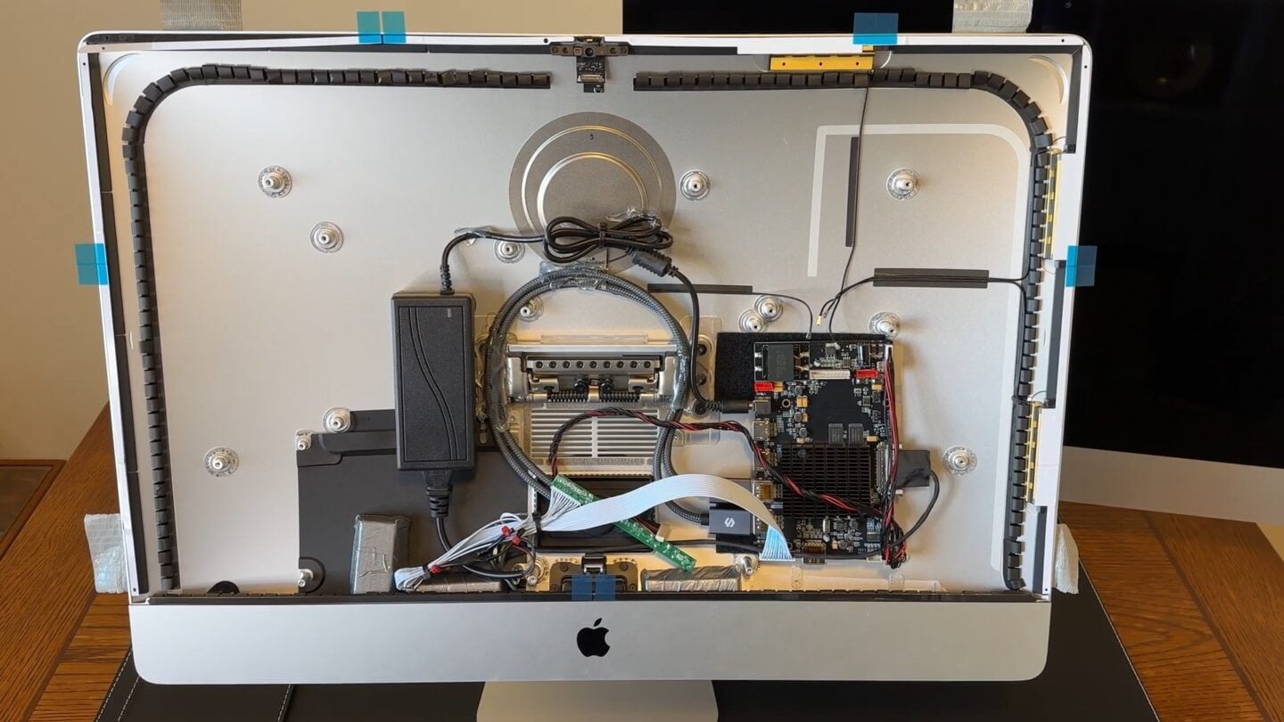 Parts Installed in iMac All the replacement parts installed in the iMac case.
