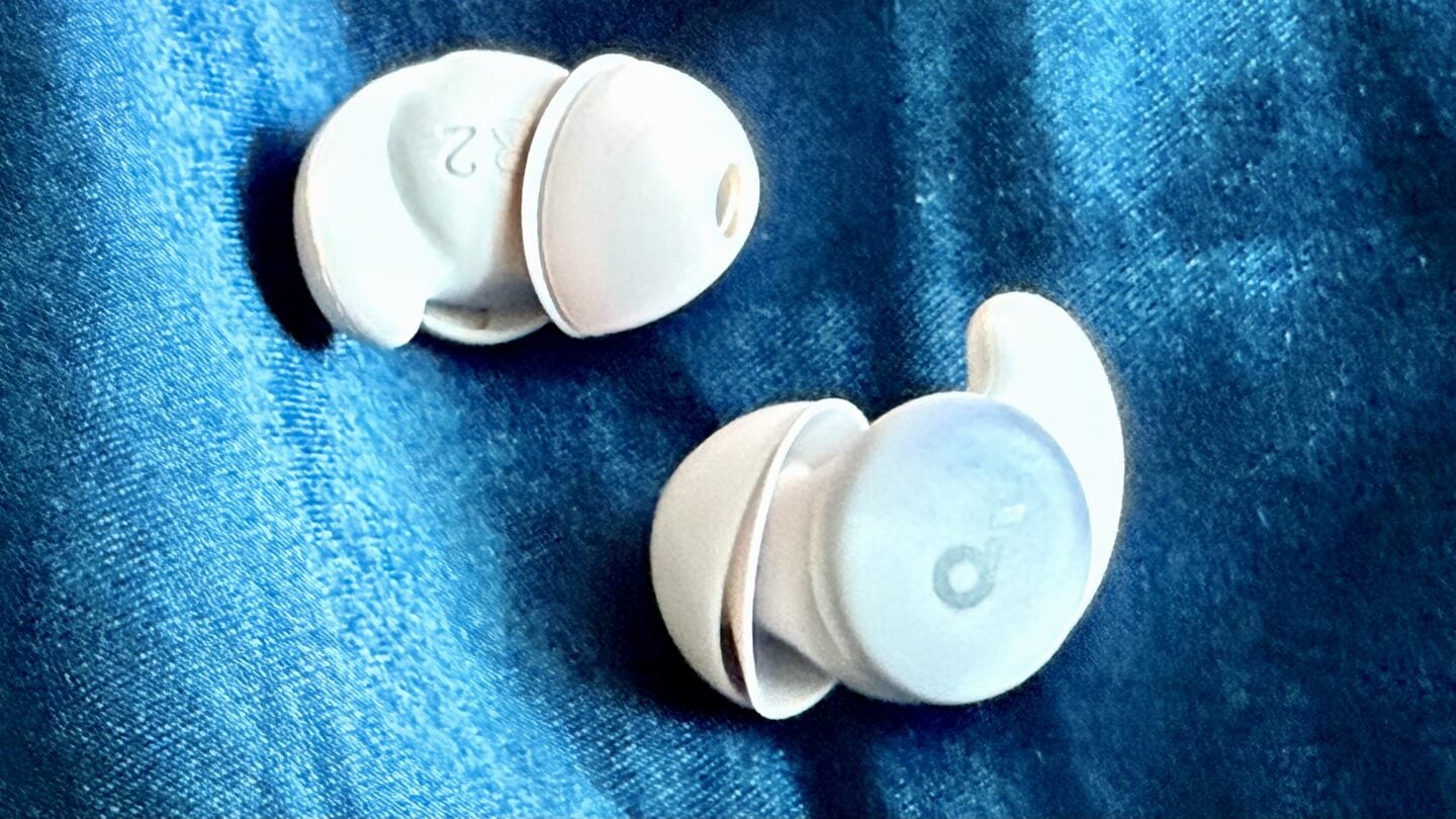 Soundcore Sleep A20 sleep earbuds Photo of soundcore Sleep A20 sleep earbuds on a blue pillow case.